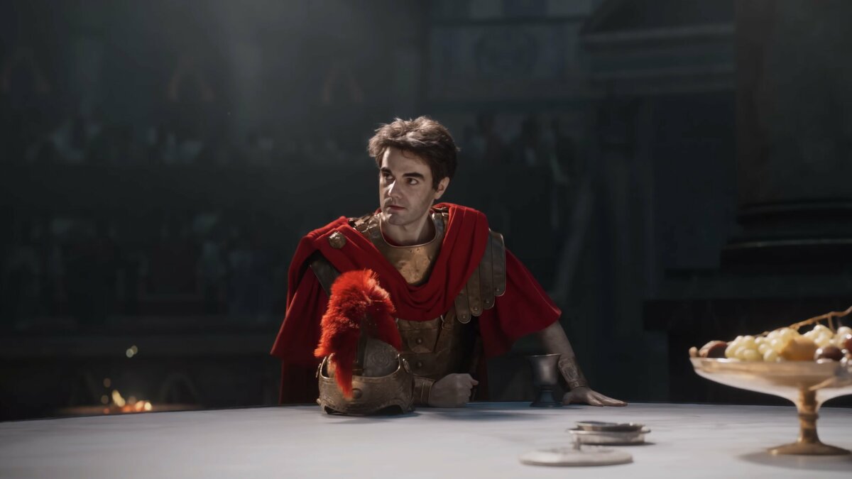 Actor in Roman costume reclining at a banquet table – Ubisoft Anno 117 film produced by Bloom
