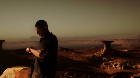 Kylian Mbappé standing on a rocky desert ridge – Hublot TVC