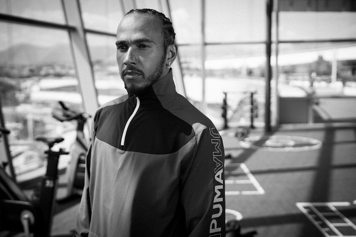 Lewis Hamilton in a Puma jacket, black-and-white portrait – Monaco