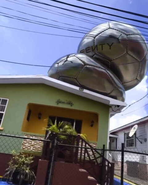 Chrome spheres stacked on a colourful house – Fenty x Puma digital campaign