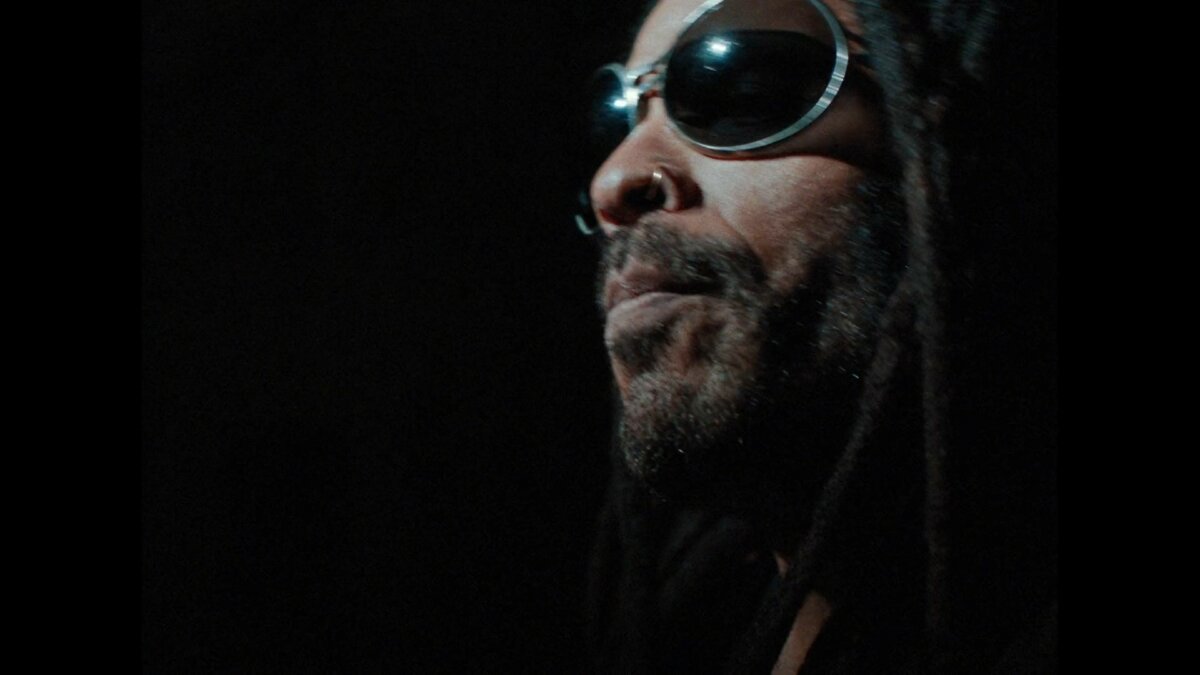 Profile portrait of Lenny Kravitz in sunglasses – “Let It Ride” music video